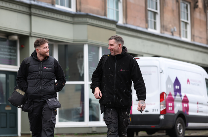 Two Magenta technicians walking 
