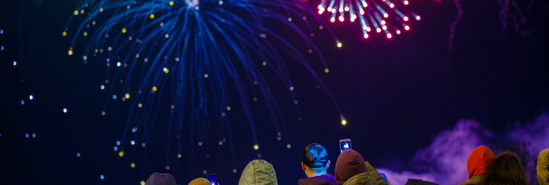 People watching a firework display