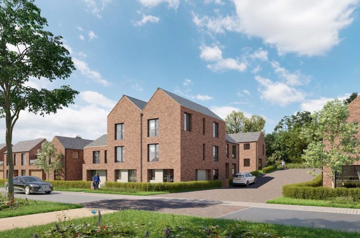Three‑storey brick homes with landscaped paths, trees and parked cars on a sunny day.